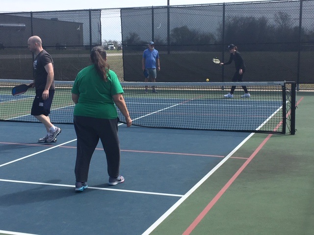 4 Beginner Pickleball Players Playing Pickleball