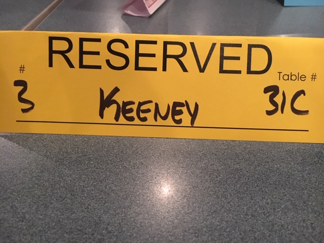 Image of a table reservation paper for Calvin Keeney at Cap City Comedy Club in Austin, Texas to see Tom Green